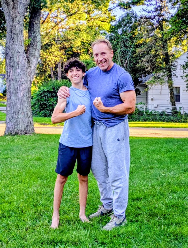 Lucan and Dad Front Yard September 2025